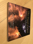 The Hand of God: Thoughts and Images Reflecting the Spirit of the Universe cover image